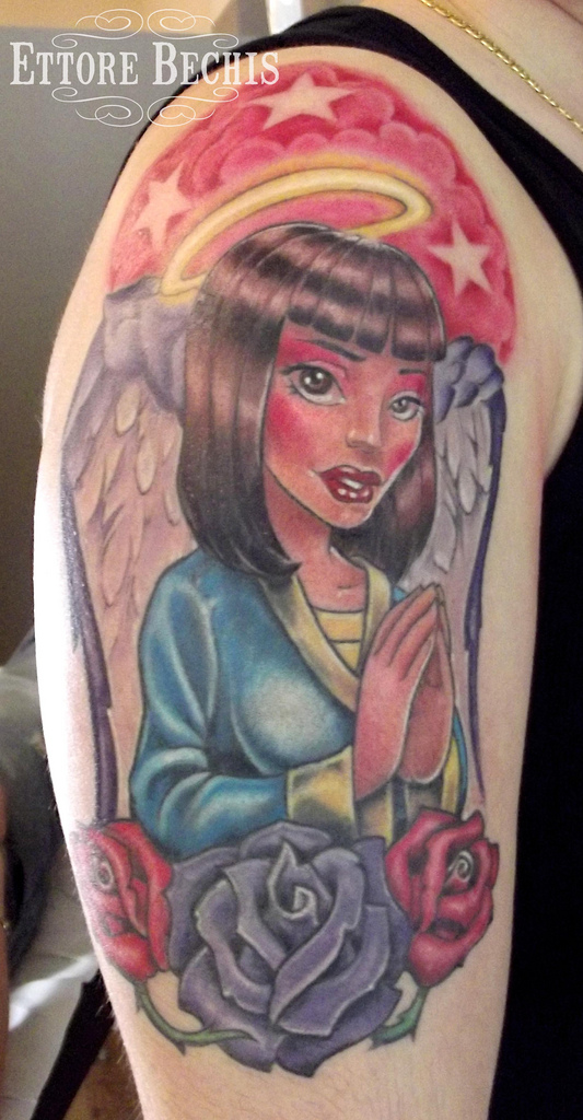 angel tattoo on arm