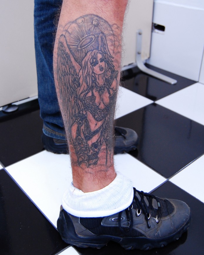 angel tattoo on calf
