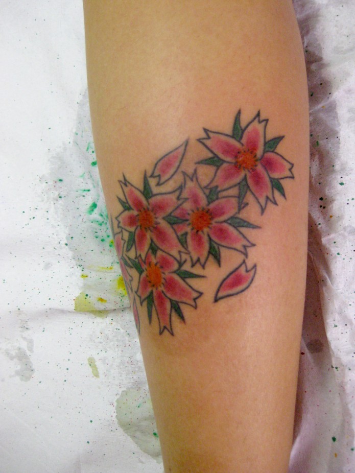 flower tattoo on calf