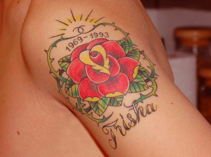 rose tattoo on shoulder