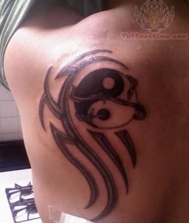 yin yang tattoo on back