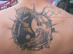 yin yang tattoo on back