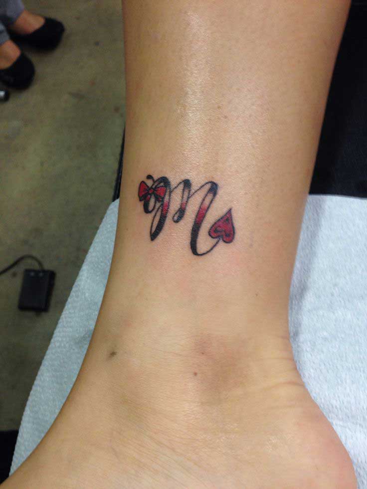 Tattoo of MV heart Love tattoo  custom tattoo designs on TattooTribescom