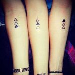 triple triangle tattoo Beanie  Spreadshirt