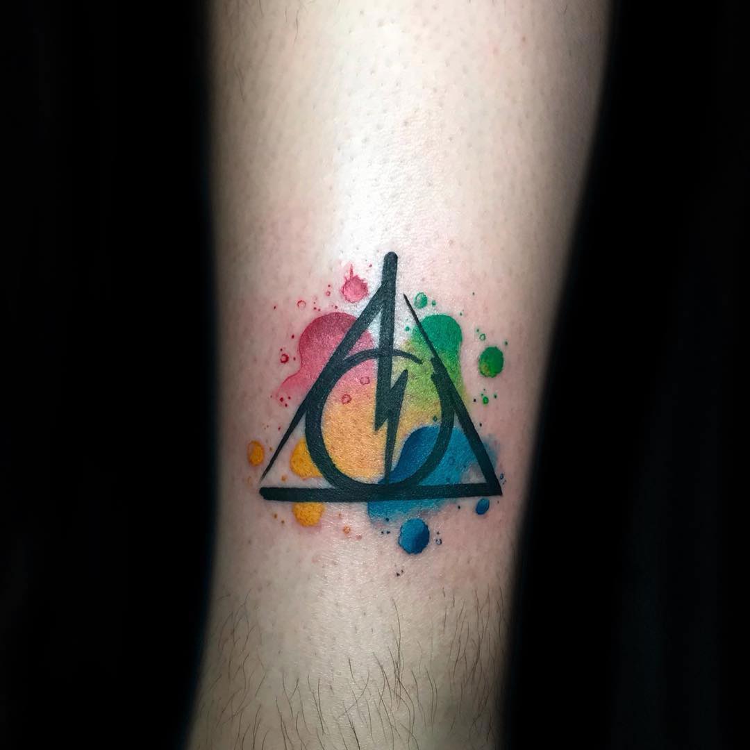 Deathly hallows tattoo watercolor.