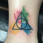 Deathly hallows watercolor tattoo  Tattoos Harry potter watercolor Deathly  hallows tattoo