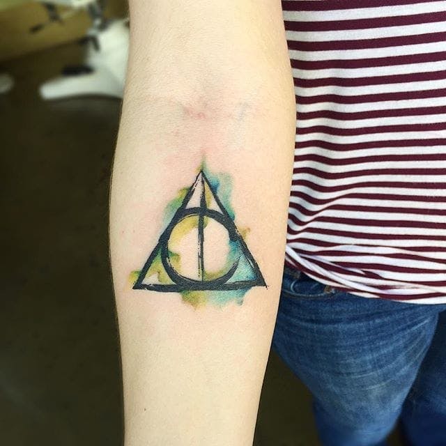 Deathly hallows tattoo watercolor.