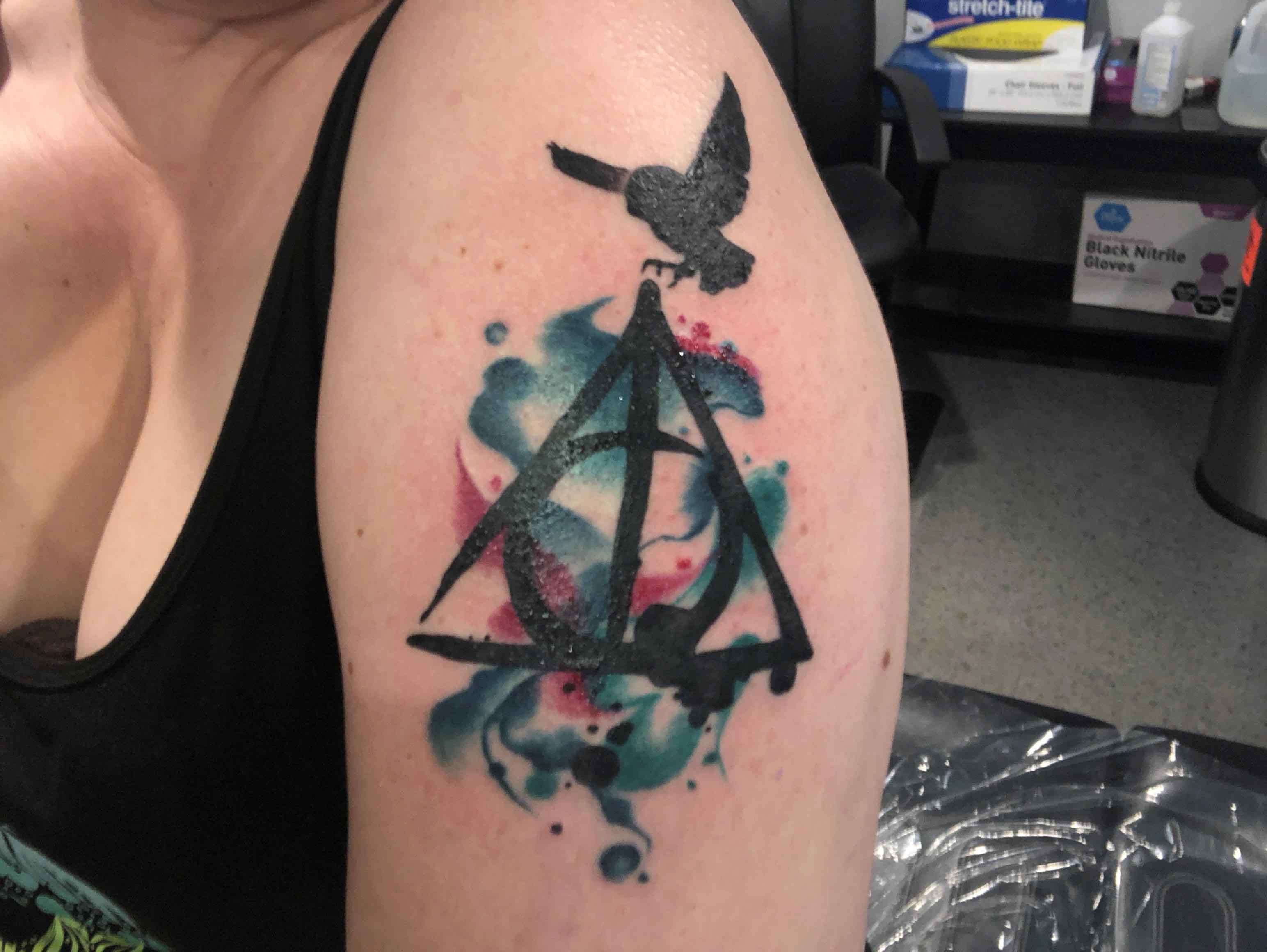 Deathly hallows tattoo watercolor.
