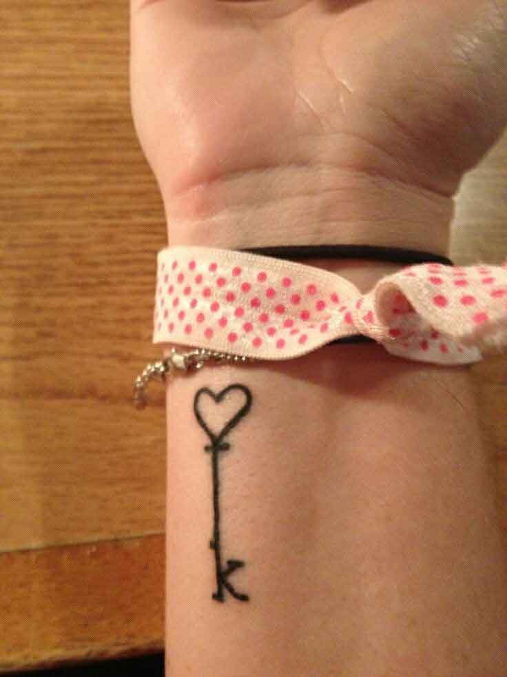 Letter K tattoo on the wrist