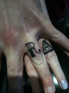 cropped view of tattooed male hand showing latin letter  R deaf and dumb  language isolated on black Stock Photo  Alamy