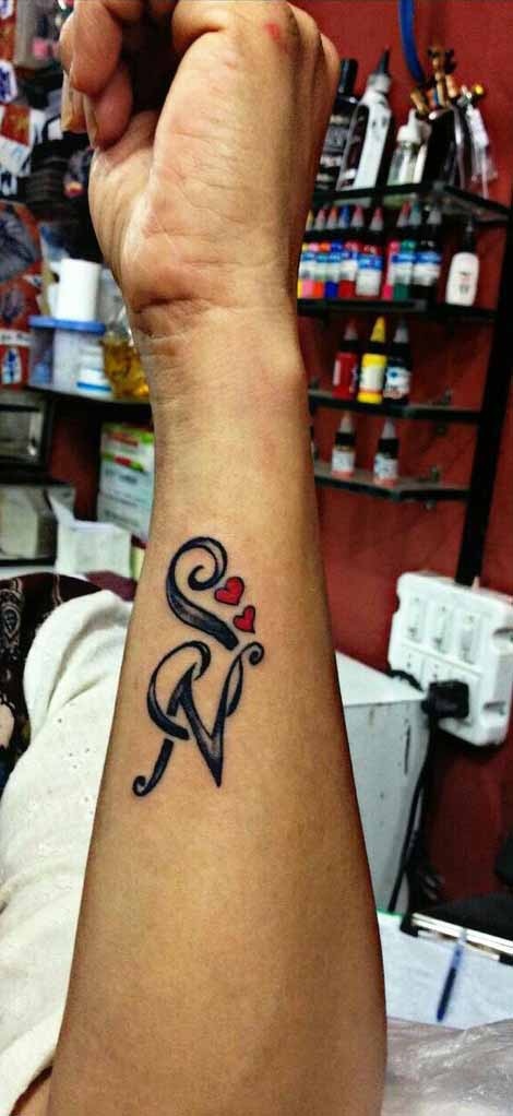 Tattoo of SNM heart Bond tattoo  custom tattoo designs on  TattooTribescom