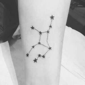 Virgo constellation tattoo on the inner forearm