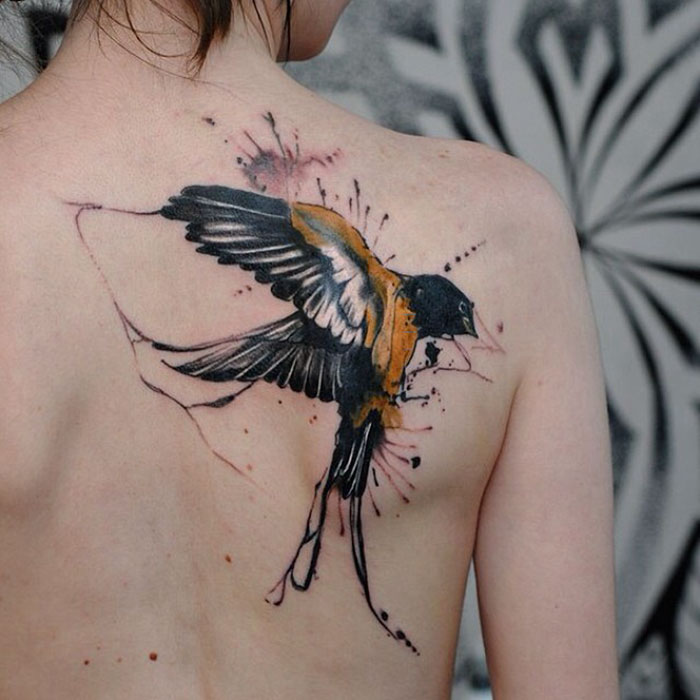 bird tattoo on back 02