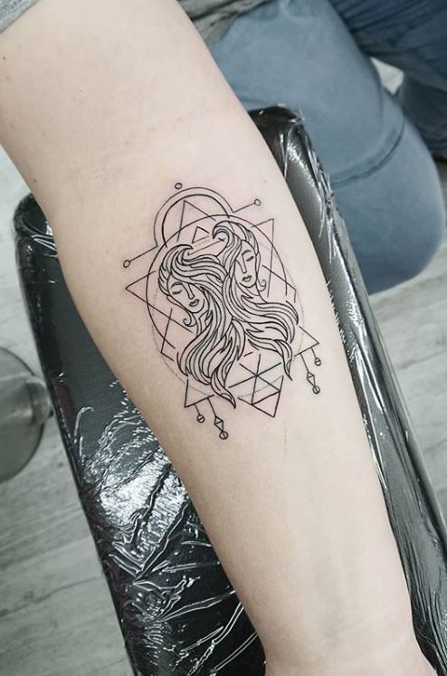 Tattoo uploaded by Lashay Evone • This on my lower left arm a gemini tattoo  • Tattoodo