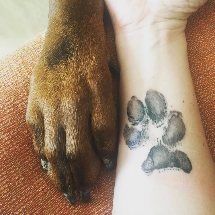 15 Adorable Paw Print Tattoo Designs for Animal Lovers