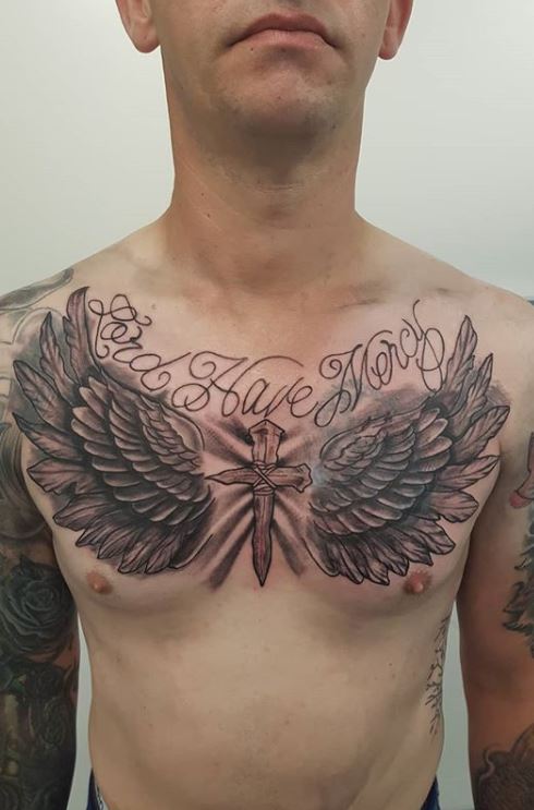 Simple Angel Wings Tattoo On Chest - Thesex Tattoo Ideas