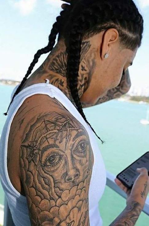 Untold Stories and Meanings Behind Young M.A's Tattoos - Tattoo Me Now