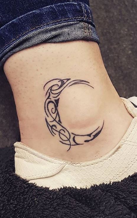 Black Outline Half Moon Tattoo On Left Ankle