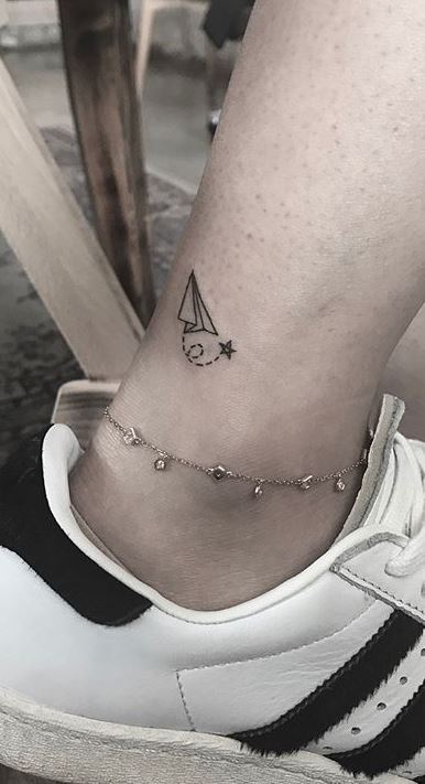 50+ Small Tattoo Ideas That Are Simple and Cool | Airplane tattoos, Small  wrist tattoos, Hand tattoos