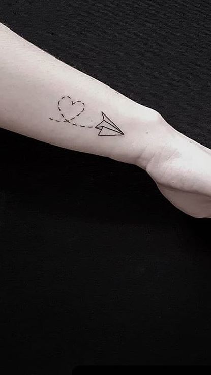 Paper airplane  watercolor style Artist hktattoowing  Airplane tattoos  Paper airplane tattoos Mini tattoos