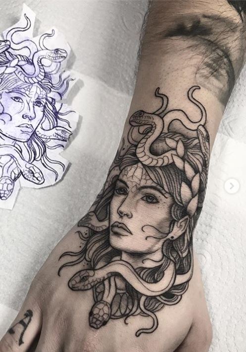 Grey Ink Medusa Tattoo On Right Forearm
