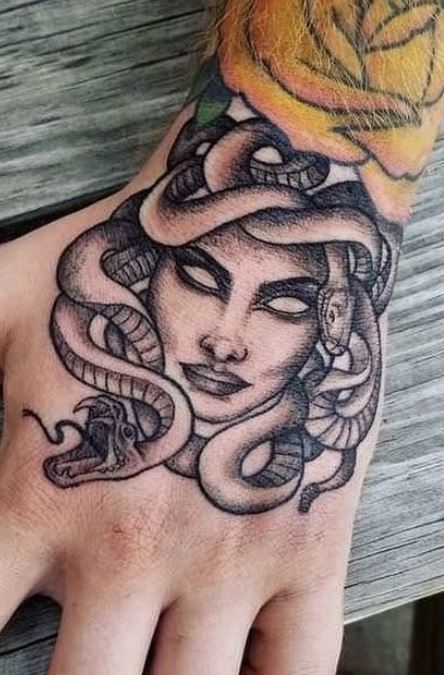 Tattoo uploaded by Nina Lovecrow  Medusa Hand tattoo   Tattoodo