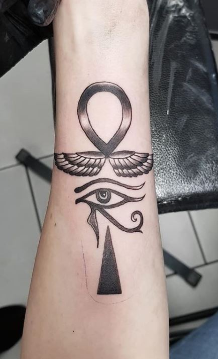 eye of horus mini tattoo finger  Round the World Magazine