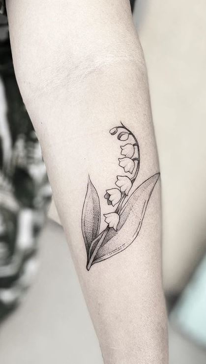 Simple lily of the valley tattoos.