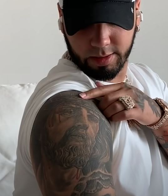 Anuel AA covers Karol Gs tattoo on his back  Pledge Times