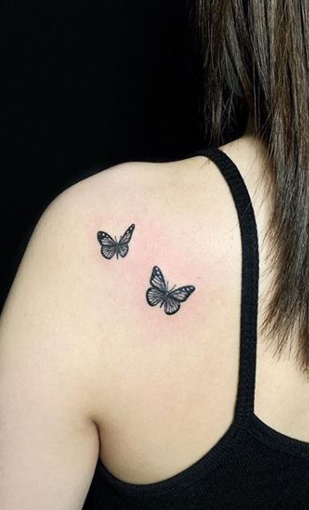 small butterfly tattoos on side of stomachTikTok Search