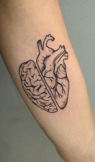 New tattoo done by Captain at Evermore Galleries in Chattanooga TN Half  heart and half brain Our brain and heart go hand and hand What we think  is what we feel 