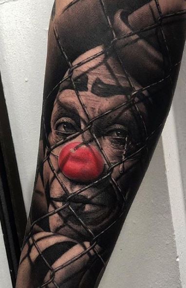 Sad clown tattoo