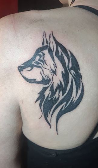 Wolf Tattoos - What's their Meaning? PLUS Ideas & Photos Wolf Tattoos - What's their Meaning? PLUS Ideas & Photos