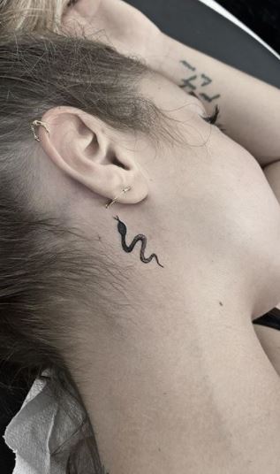 Shoulder Snake Neck Tattoo by Three Kings Tattoo
