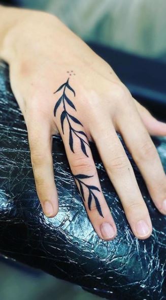 Tattoo uploaded by Tommy  Rose w freehand vines wrapping around fingers   Tattoodo