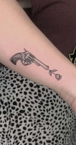 45 Amazing Gun Tattoo Designs