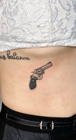 Girl with gun tattoo  Stock Photo 6281088  PIXTA