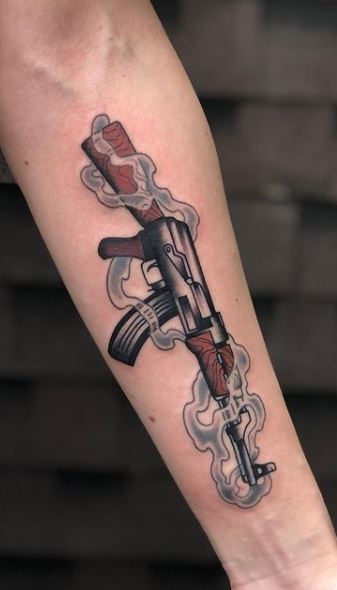 25 of the Best Gun Tattoos  Tattoo Insider