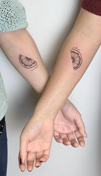 Black Infinity Sisters In Heart Tattoo On Heel