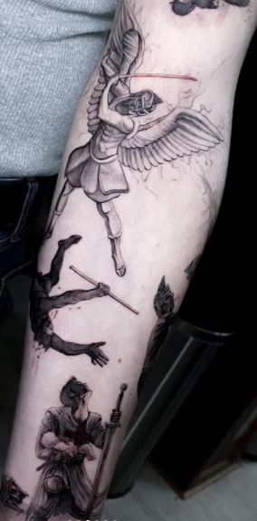 MIchael the Arch Angel Stabbing Satan with Cross Spear Best temporary  tattoos| WannaBeInk.com