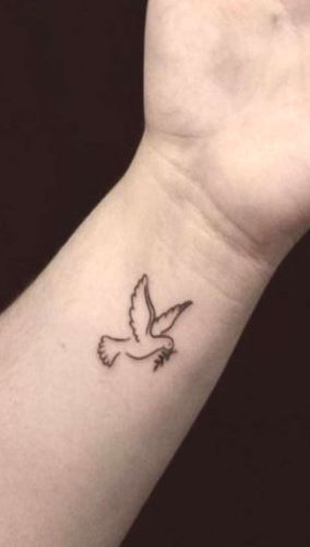 The little dove was my first tat 14 years ago  ragedtattoos