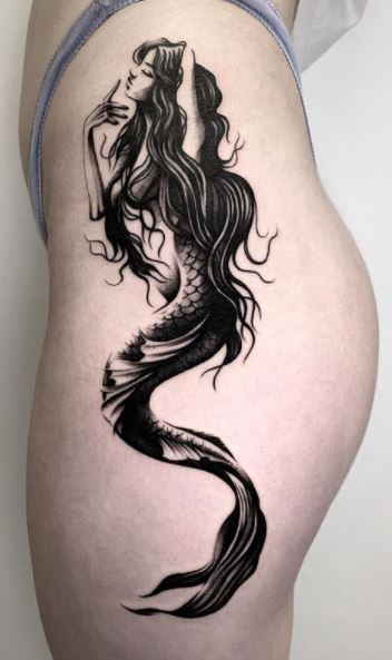 Mermaid tattoo for @katiedevxo 🧜‍♀️ 🦋 booking September🖤 #mermaid  #blackworkers #tattooartist #bodyart #longisland #pinebarrenstattoo… |  Instagram
