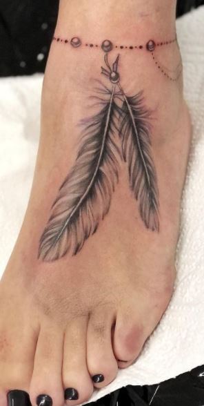 Feather Tattoo Design On Foot  Tattoo Designs Tattoo Pictures