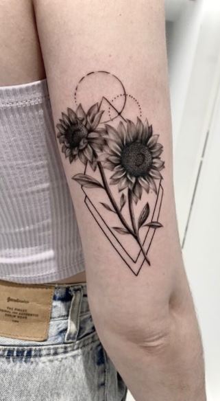 Black sunflower tattoo on the thigh  Tattoogridnet
