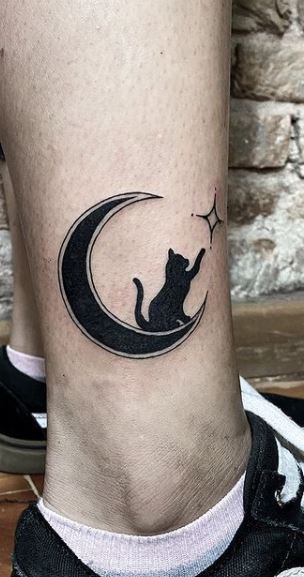 28 Best Cat and Moon Tattoo Designs  The Paws  Moon tattoo designs Moon  tattoo Cat eye tattoos