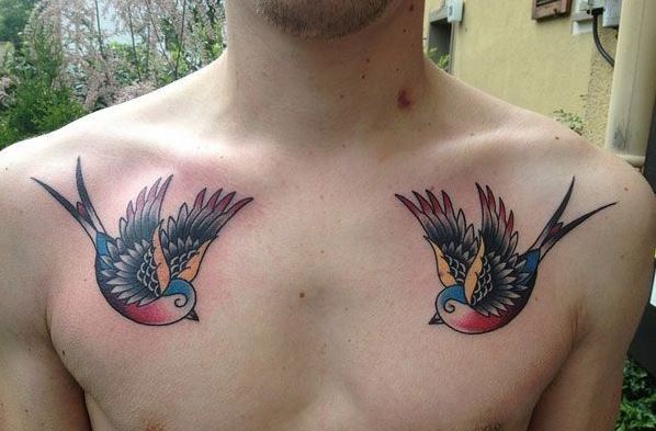 Free bird tattoo on the left collarbone