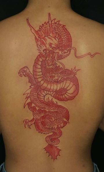 Red Ink Spine Tattoo On Man Back