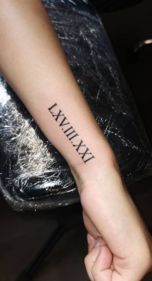 50 Sensational Roman Numeral Tattoos! - Tattoo Me Now