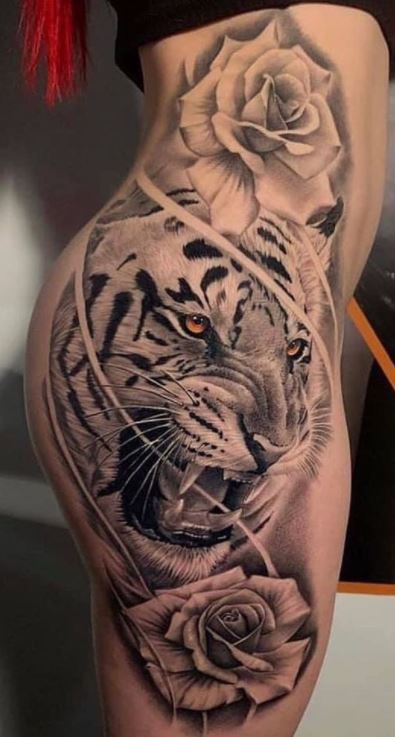 Tattoo uploaded by Tara  Artist marconigiotti tiger rose sleeve   Tattoodo