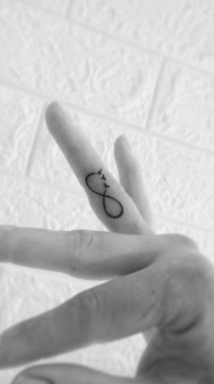 Wedding Rings  Ring finger tattoos Infinity ring tattoo Wedding band  tattoo